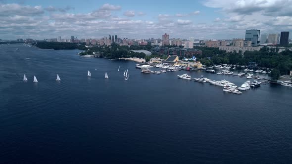 Exciting Bird's Eye View of Yachts Racing on the River