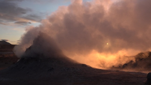 Iceland. Geothermal region area valley with smoking fumaroles and hot streaming water from geysers. alt
