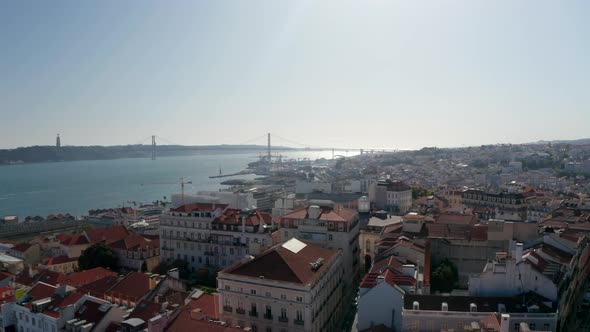 Panoramic Aerial View of Town with Long Cablestayed Bridge Spanning Tagus River alt
