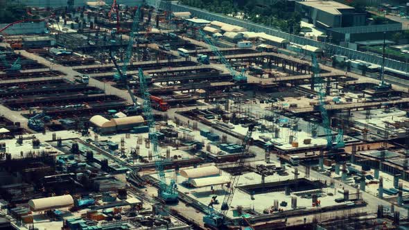 Large Construction Site with Heavy Construction Machinery in Metropolis alt