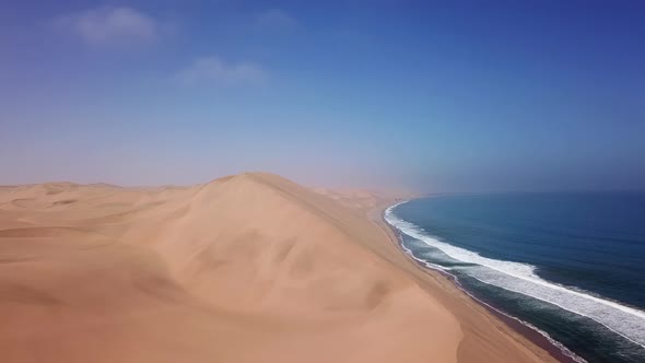 Sandwich Harbour in Namibia at the Coast of the Atlantic Ocean alt