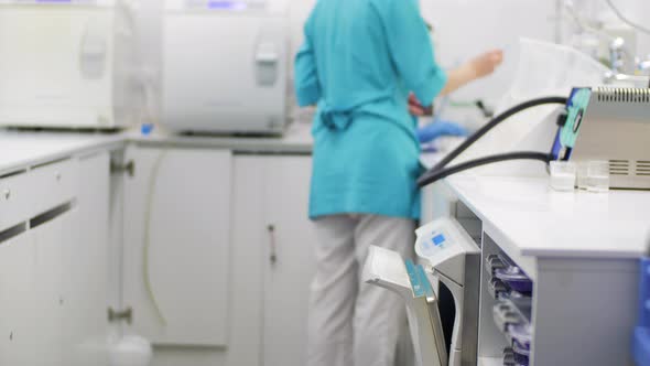 Nurses Preparing Medical Equipment in Clinic Lab