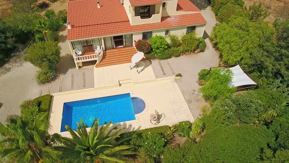 Aerial Video of Private Luxury Villa a Delightful Pool and Some Nice Green Vegetation