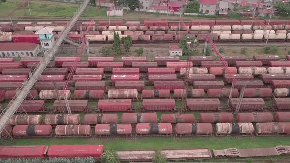 Drone, marshalling yard. there are a lot of railway cars there. depot. Trains . alt