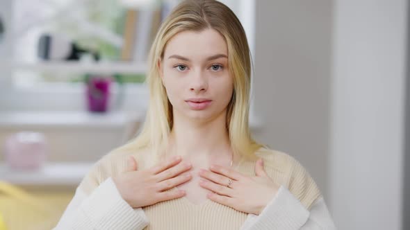 Portrait of Positive Young Disabled Deaf Woman Showing I Love you Gesture in Sign Language and alt