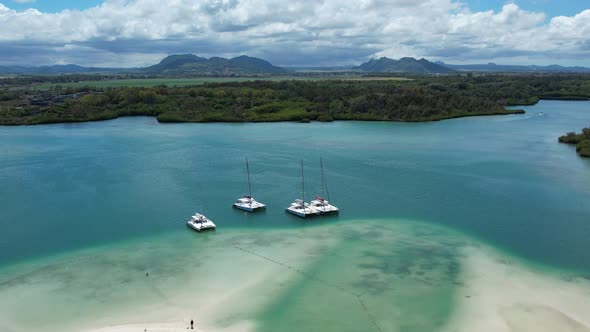 Catamaran boat on island alt