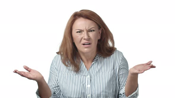 Confused and Disappointed Pissed Redhead Adult Woman Feeling Frustrated and Bothered Frowning Stare alt