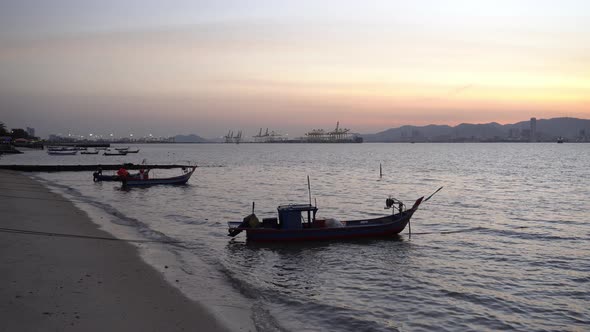 Silhouette Malays fishing boat at Pantai Bersih alt