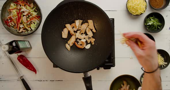 Chef Cooking Meat and Shrimp on Pan alt