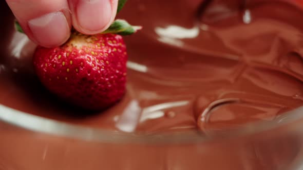 Strawberry in Melted Chocolate Closeup Melting Chocolate Bar for Fondue alt