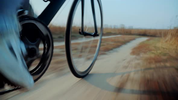 Cyclist Riding On Gravel Bike Cycling. Trail Cyclist Athlete Workout Riding On Gravel Bicycle. alt