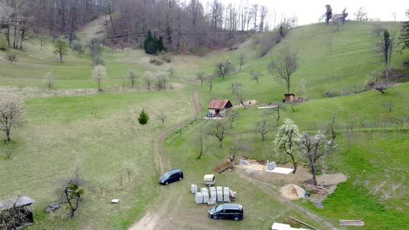 An old rural cabin in the middle of a pasture alt