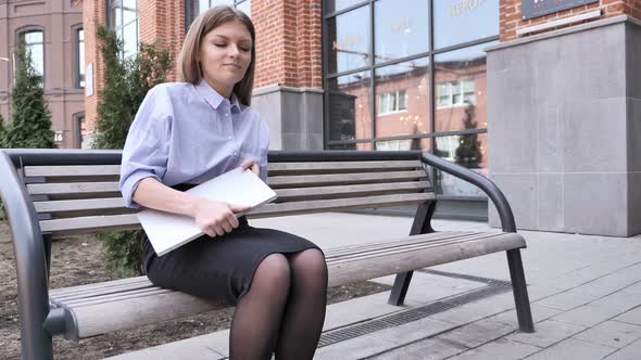 Outdoor Sitting Woman Leaving to Office for Interview alt