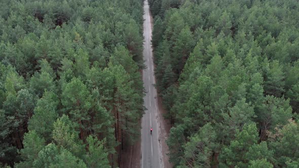 Triathlete cyclist training on bicycle alt