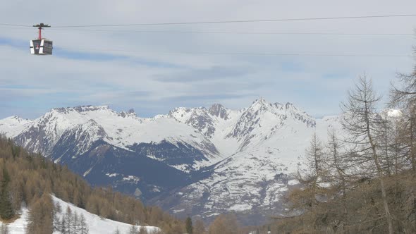 Scenery of a cable car and mountains alt