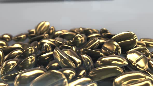 Golden coffee beans lie on a gray background. 3D animation of heaps of golden coffee beans
