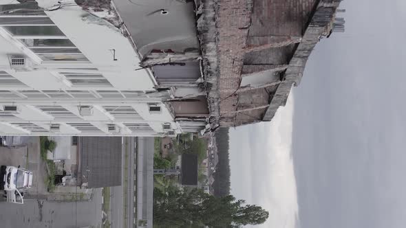 Vertical Video of a Wardamaged Apartment Building in Ukraine alt
