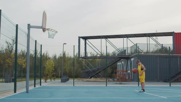 Young boy throwing a ball alt