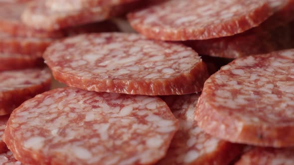 Slow pan cured sausage of air-dried meat cuts 4K 2160p 30fps UltraHD footage - Tasty dry  salami  sm alt