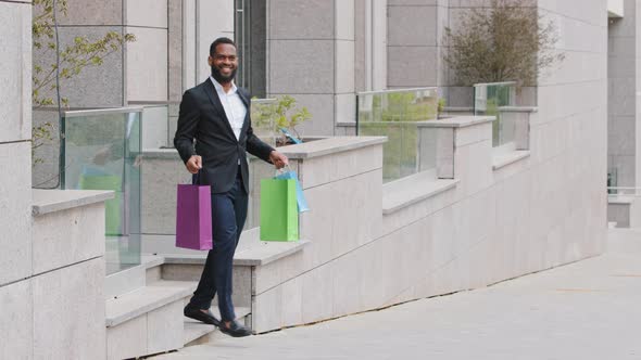 Happy About Nice Things Bought African Ethnicity Bearded Businessman Coming Out of Store alt
