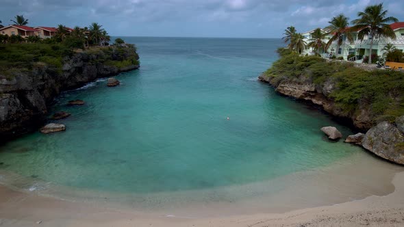 Playa Lagun Beach Cliff Curacao Beautiful Tropical Bay with White Sand and Blue Ocean Curacao alt