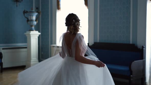 Beautiful Bride Is Spinning in a Wedding Dress