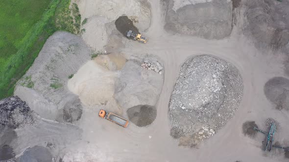 Excavator loader with backhoe works.Aerial View alt