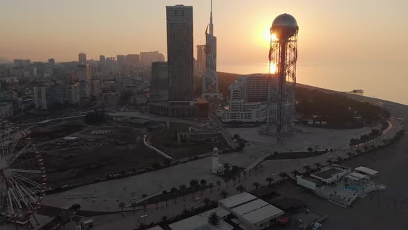 Aerial View Of Beautiful Architecture Buildings In Batumi With Sunset Background  alt