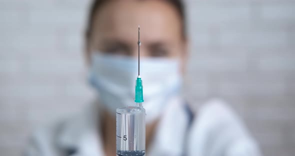 Doctor Testing Injections alt