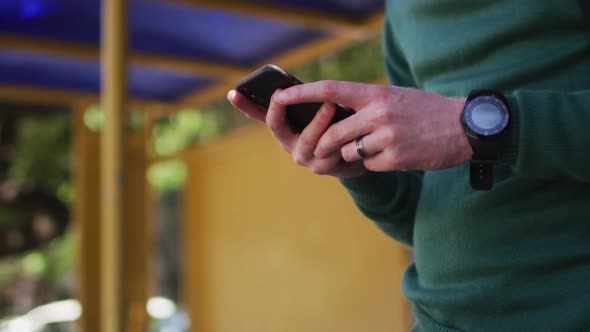 Albino african american man using smartphone alt