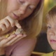 A Woman and Her Little Son Visit a Cafe with Exotic Animals