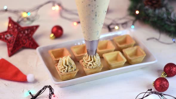 Making Christmas appetizers with savory seafood pate alt