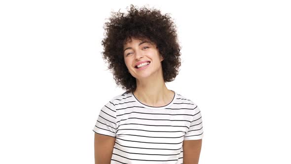Slow Motion Portrait of Cute Young Woman Being Positive Smiling Broadly Showing Her White Teeth at alt