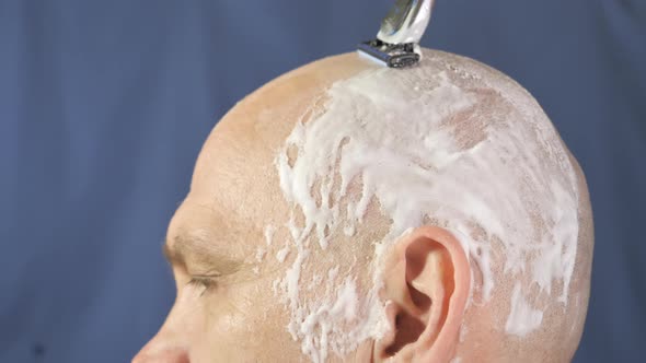 The Other Side of the Head with the White Shaving Cream