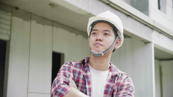 Portrait of Professional Engineer / Worker Wearing Safety Uniform, close up.
