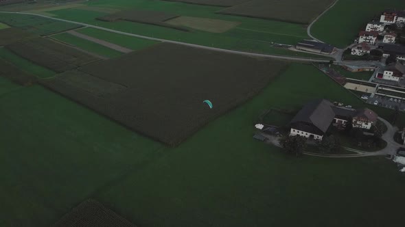 Paraglider on the Background of Alpine Meadows