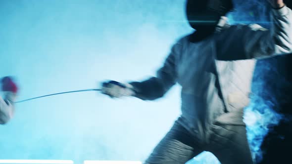 Fencing Training of Two Professional Athletes alt