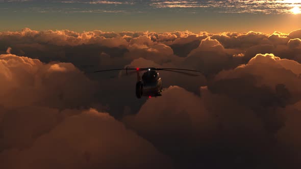 Helicopter Flies Above the Clouds on Sunset 4k