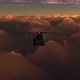 Helicopter Flies Above the Clouds on Sunset 4k - VideoHive Item for Sale
