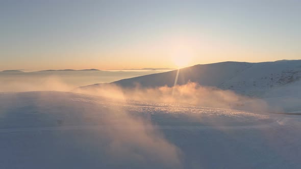 Misty Mountains in Sunny Winter Day, Aerial View alt