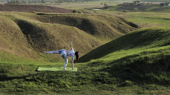 Woman Practicing Yoga in Nature alt