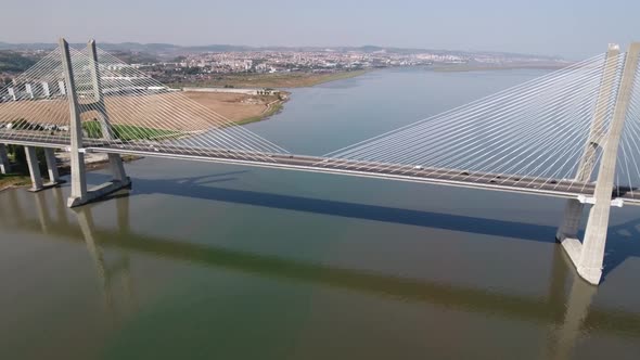 Flying over the longest bridge in Europe - Vasco da Gama in Lisbon, Portugal alt
