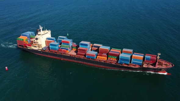 Aerial view of cargo ship in float in sea alt