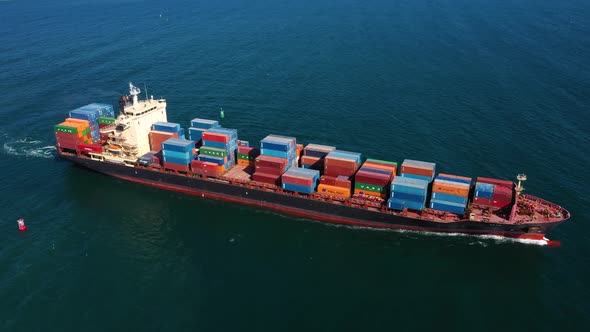 Aerial view of cargo ship in float in sea
