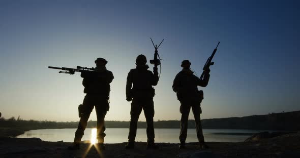 Three Soldiers Posing with Guns, Stock Footage | VideoHive