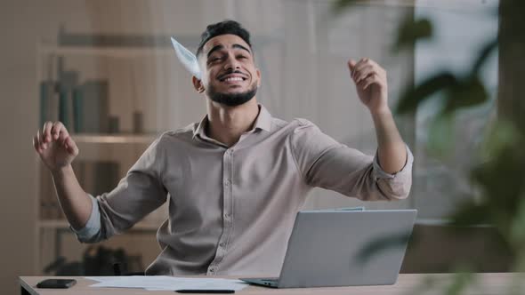 Amazed Happy Businessman Hispanic Guy Worker Winner Dance at Office Emotional Young Man Feel alt