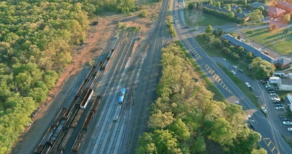 Aerial View of Long Railroad Located Area Loading Station Road in the Small Residential Area alt