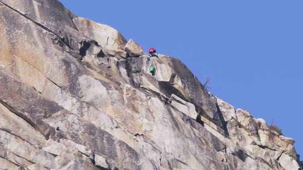 Time Lapse of Alpinist Climbing Top of High El Capitan in Yosemite National Park alt