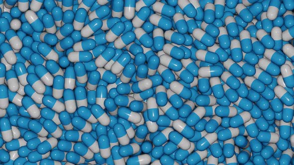 Rows of 3D Render Close Up Blue and White Pills Falling and Moves on Conveyor