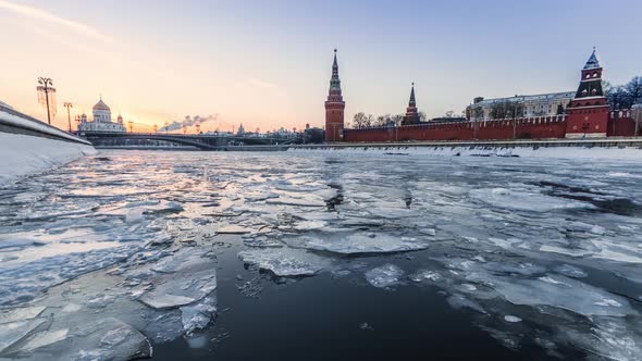 Ice floating on Moskva river in front of Kremlin wall 